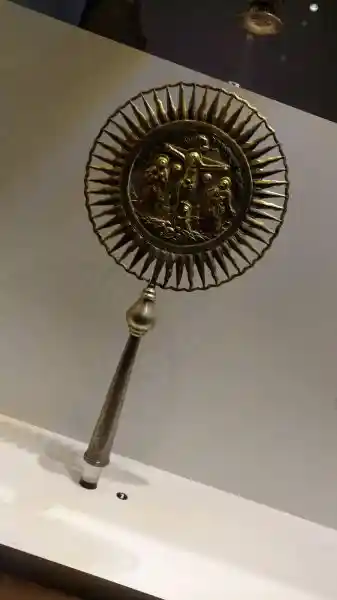 A crucifix inside a solar disc